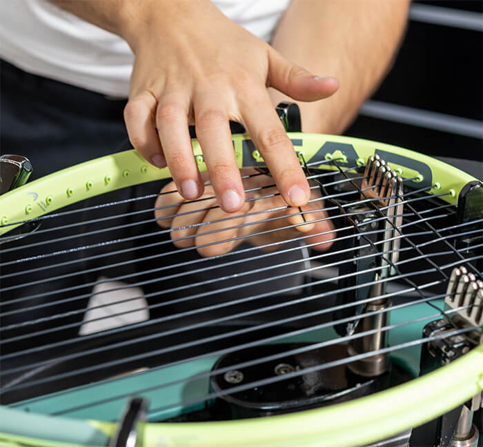 Besaitungsservice Genf Tennis Badminton Squash